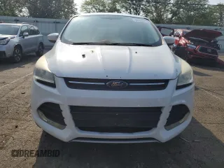 2014 Ford Escape SE z VIN 1FMCU9GX5EUC60849, wystawiony jako Copart lot #60498575 z przebiegiem Nie podano mil oraz Szkoda całkowita • Salvage title. Historia ofert i sprzedaży dostępna na DreamBid. Obrazek 5.