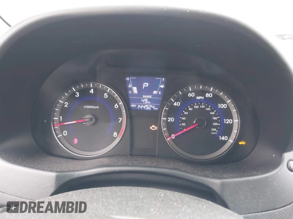 2013 Hyundai Accent SE z VIN KMHCU5AE2DU061871, wystawiony jako IAAI lot #41572034 z przebiegiem 147 924 mil mil oraz . Historia ofert i sprzedaży dostępna na DreamBid. Obrazek 7.