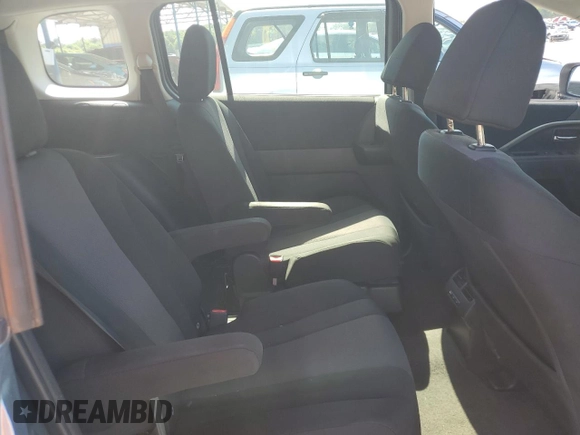 2013 Mazda 5 Sport z VIN JM1CW2BLXD0148001, wystawiony jako Copart lot #63296815 z przebiegiem 162 513 mil mil oraz Szkoda całkowita • Salvage title. Historia ofert i sprzedaży dostępna na DreamBid. Obrazek 11.