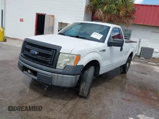 2013 Ford F-150 XL with VIN 1FTMF1CM9DFC13973, listed as a IAAI auction lot 42326721 with 209,911 mi miles and . Bid and sale history available at DreamBid. Image 2.