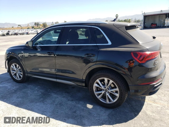 2021 Audi Q3 S line Premium with VIN WA1DECF39M1042148, listed as a Copart auction lot 59171333 with 13,894 mi miles and Salvage title. Bid and sale history available at DreamBid. Image 2.