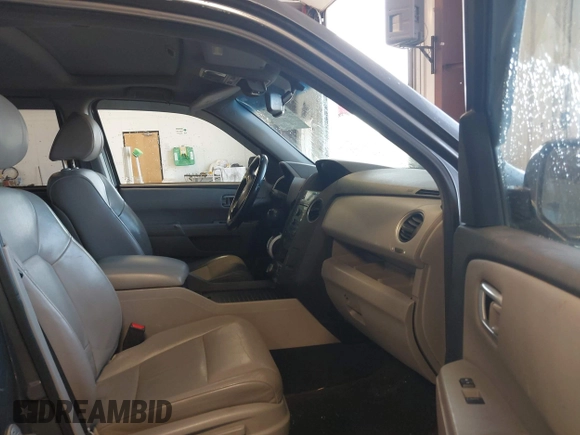 2010 Honda Pilot Touring with VIN 5FNYF4H89AB026005, listed as a IAAI auction lot 42118607 with 182,689 mi miles. Bid and sale history available at carsss.com. Image 5.
