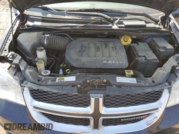 2016 Dodge Grand Caravan SXT with VIN 2C4RDGCGXGR160870, listed as a Copart auction lot 47705295 with 214,215 mi miles and Clean Title. Bid and sale history available at DreamBid. Image 12.