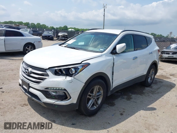 2018 Hyundai Santa Fe 2.4L z VIN 5NMZUDLB3JH055771, wystawiony jako IAAI lot #42126058 z przebiegiem 142 991 mil mil oraz . Historia ofert i sprzedaży dostępna na DreamBid. Obrazek 17.