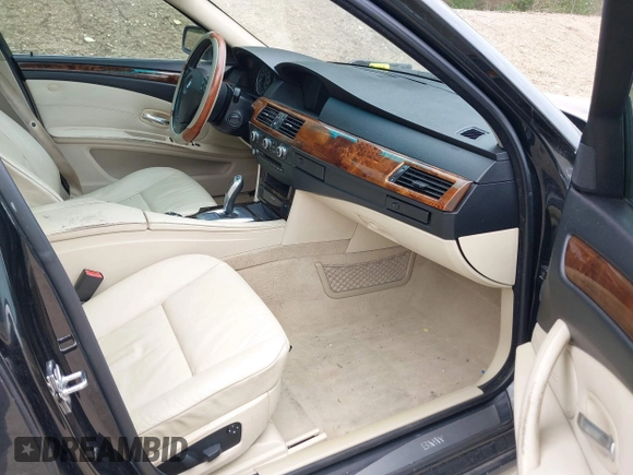 2009 BMW 5 Series 528i with VIN WBANU53579C122572, listed as a IAAI auction lot 42069912 with 142,754 mi miles and . Bid and sale history available at carsss.com. Image 5.