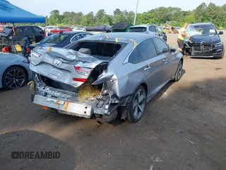 2020 Honda Accord Touring z VIN 1HGCV2F93LA017701, wystawiony jako IAAI lot #42383938 z przebiegiem 40 945 mil mil oraz . Historia ofert i sprzedaży dostępna na DreamBid. Obrazek 4.