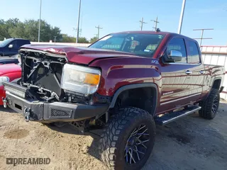 2014 GMC Sierra 1500 SLT with VIN 1GTV2VEC4EZ108365, listed as a IAAI auction lot 40968279 with 80,575 mi miles. Bid and sale history available at carsss.com. Image 2.