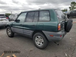 1999 Toyota RAV4 with VIN JT3GP10V2X0037464, listed as a Copart auction lot 54732085 with 306,550 mi miles and Clean Title. Bid and sale history available at DreamBid. Image 2.