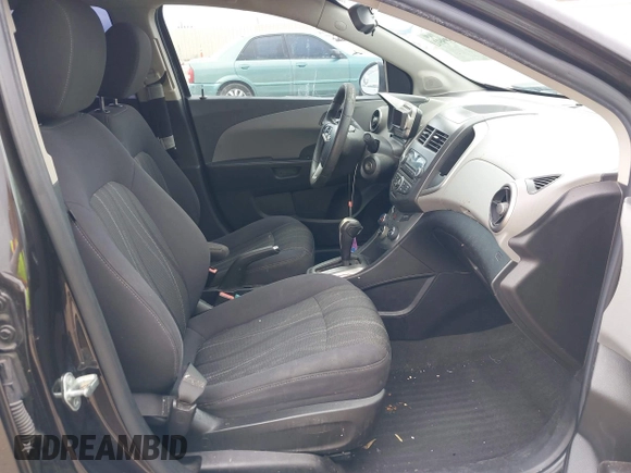 2013 Chevrolet Sonic LT with VIN 1G1JC5SH7D4236146, listed as a IAAI auction lot 39859991 with 135,006 mi miles and . Bid and sale history available at DreamBid. Image 5.