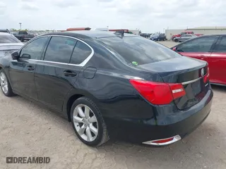 2014 Acura RLX with VIN JH4KC1F36EC002427, listed as a IAAI auction lot 42099583 with 114,671 mi miles. Bid and sale history available at carsss.com. Image 3.