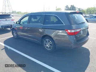 2011 Honda Odyssey EX-L with VIN 5FNRL5H62BB058765, listed as a IAAI auction lot 42017802 with 178,512 mi miles and . Bid and sale history available at carsss.com. Image 3.