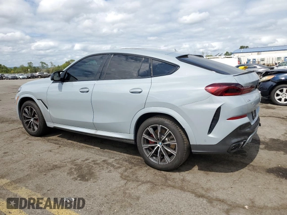 2025 BMW X6 M60i with VIN 5UX43EX06S9W68023, listed as a Copart auction lot 69874764 with 3,789 mi miles and Salvage Title. Bid and sale history available at carsss.com. Image 2.