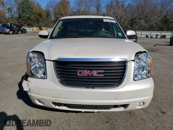2013 GMC Yukon SLT with VIN 1GKS1CE05DR259086, listed as a Copart auction lot 42103305 with 130,079 mi miles and Salvage Title. Bid and sale history available at carsss.com. Image 5.