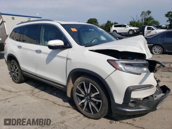 2022 Honda Pilot Touring 7-Passenger with VIN 5FNYF6H64NB054732, listed as a Copart auction lot 63036104 with 33,252 mi miles and Salvage Title. Bid and sale history available at carsss.com. Image 4.