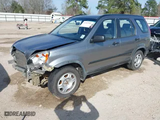 2006 Honda CR-V LX with VIN JHLRD68586C024863, listed as a IAAI auction lot 41569505 with 210,624 mi miles. Bid and sale history available at carsss.com. Image 18.