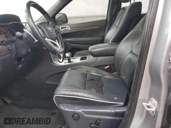 2014 Jeep Grand Cherokee Overland with VIN 1C4RJECG9EC341865, listed as a Copart auction lot 44354615 with 141,601 mi miles and Salvage Title. Bid and sale history available at carsss.com. Image 7.