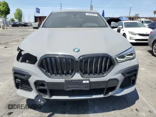 2022 BMW X6 xDrive40i z VIN 5UXCY6C01N9M95573, wystawiony jako Copart lot #54049805 z przebiegiem 24 031 mil mil oraz Szkoda całkowita • Salvage title. Historia ofert i sprzedaży dostępna na DreamBid. Obrazek 5.