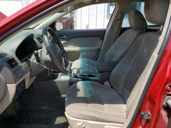 2010 Ford Fusion SE with VIN 3FAHP0HG9AR180165, listed as a Copart auction lot 62168585 with 99,706 mi miles and Salvage title. Bid and sale history available at DreamBid. Image 7.