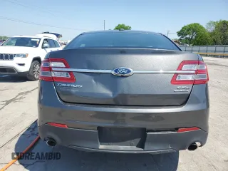 2015 Ford Taurus SEL z VIN 1FAHP2E83FG125234, wystawiony jako Copart lot #54404745 z przebiegiem 107 311 mil mil oraz Szkody całkowita. Historia ofert i sprzedaży dostępna na DreamBid. Obrazek 6.