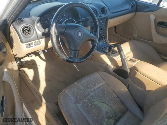 1999 Mazda MX-5 Miata with VIN JM1NB3533X0134984, listed as a Copart auction lot 50886865 with 0 mi miles and Salvage Title. Bid and sale history available at carsss.com. Image 8.