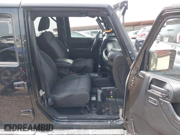 2012 Jeep Wrangler Unlimited Sport with VIN 1C4BJWDG3CL200826, listed as a IAAI auction lot 42261113 with 135,554 mi miles and . Bid and sale history available at DreamBid. Image 5.