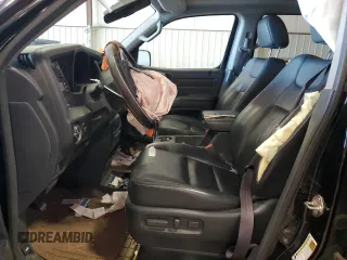 2013 Honda Ridgeline RTL with VIN 5FPYK1F50DB015599, listed as a Copart auction lot 50852074 with 159,411 mi miles and Salvage Title. Bid and sale history available at carsss.com. Image 7.