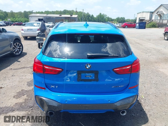 2021 BMW X1 xDrive28i with VIN WBXJG9C04M5T61811, listed as a IAAI auction lot 42509852 with 30,400 mi miles and . Bid and sale history available at DreamBid. Image 16.