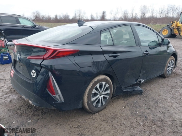 2021 Toyota Prius Prime LE with VIN JTDKAMFP2M3165859, listed as a IAAI auction lot 41943098 with 20,306 mi miles. Bid and sale history available at carsss.com. Image 4.