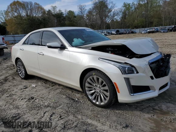 2014 Cadillac CTS Luxury AWD z VIN 1G6AX5SXXE0155317, wystawiony jako Copart lot #53205315 z przebiegiem 83 719 mil mil oraz Szkoda całkowita • Salvage title. Historia ofert i sprzedaży dostępna na DreamBid. Obrazek 4.