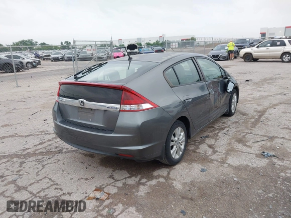 2012 Honda Insight EX with VIN JHMZE2H79CS004299, listed as a IAAI auction lot 42296207 with 170,288 mi miles and . Bid and sale history available at DreamBid. Image 4.