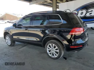 2013 Volkswagen Touareg Lux with VIN WVGEF9BPXDD001489, listed as a Copart auction lot 55898945 with 96,477 mi miles and Clean Title. Bid and sale history available at DreamBid. Image 2.