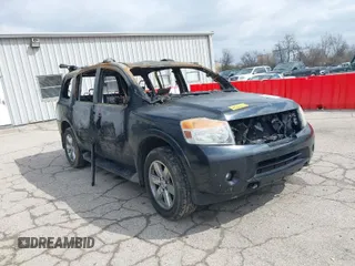2014 Nissan Armada Platinum z VIN 5N1AA0NE5EN606678, wystawiony jako IAAI lot #41933480 z przebiegiem Nie podano mil oraz . Historia ofert i sprzedaży dostępna na DreamBid. Obrazek 1.