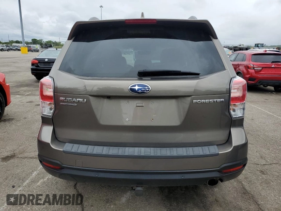 2018 Subaru Forester Touring with VIN JF2SJAWC9JH570189, listed as a Copart auction lot 57940935 with 76,574 mi miles and Salvage title. Bid and sale history available at DreamBid. Image 6.