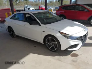 2023 Hyundai Elantra N Line z VIN KMHLR4AF9PU532312, wystawiony jako IAAI lot #42047218 z przebiegiem 29 938 mil mil oraz . Historia ofert i sprzedaży dostępna na DreamBid. Obrazek 1.