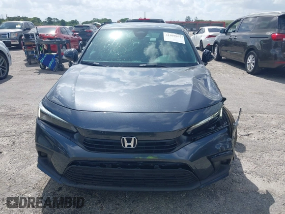 2024 Honda Civic Sedan Sport with VIN 2HGFE2F59RH594821, listed as a IAAI auction lot 41959977 with 11,271 mi miles. Bid and sale history available at carsss.com. Image 12.