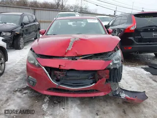2016 Mazda Mazda3 i Grand Touring with VIN 3MZBM1N77GM245567, listed as a IAAI auction lot 41330883 with 128,423 mi miles. Bid and sale history available at carsss.com. Image 12.