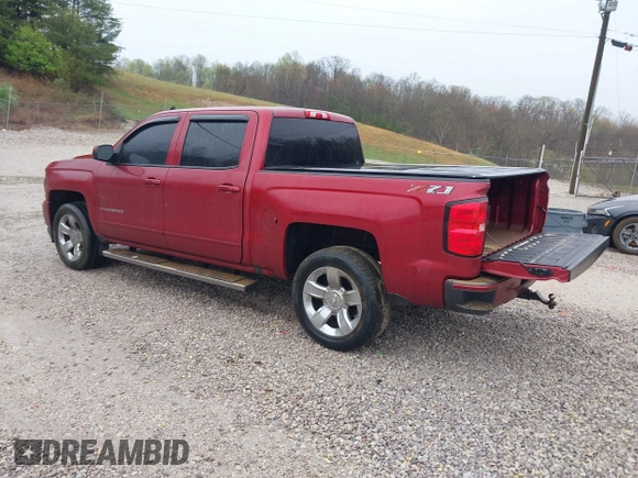 2018 Chevrolet Silverado 1500 LT with VIN 3GCUKREC2JG201754, listed as a IAAI auction lot 41944175 with 112,305 mi miles. Bid and sale history available at carsss.com. Image 3.