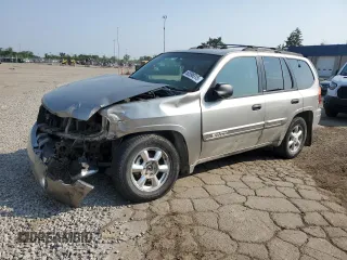 2003 GMC Envoy SLE z VIN 1GKDT13S432404783, wystawiony jako Copart lot #60599315 z przebiegiem 219 383 mil mil oraz Czysty tytuł • Clean title. Historia ofert i sprzedaży dostępna na DreamBid. Obrazek 1.