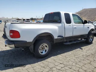 1999 Ford F-150 XL with VIN 1FTRX08LXXKA81637, listed as a Copart auction lot 64637375 with Not provided miles and Salvage title. Bid and sale history available at DreamBid. Image 3.