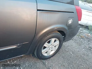 2007 Nissan Quest with VIN 5N1BV28U87N135698, listed as a IAAI auction lot 40550826 with 999,999 mi miles. Bid and sale history available at carsss.com. Image 6.
