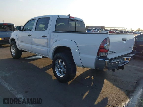 2014 Toyota Tacoma PreRunner with VIN 3TMJU4GN3EM160587, listed as a IAAI auction lot 42710985 with 200,867 mi miles and . Bid and sale history available at DreamBid. Image 3.