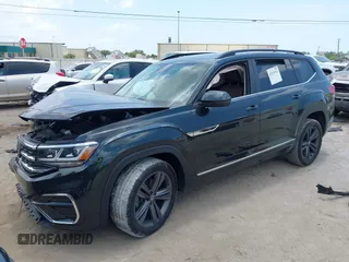 2021 Volkswagen Atlas SE z VIN 1V2PR2CA7MC510191, wystawiony jako IAAI lot #42235942 z przebiegiem 108 597 mil mil oraz . Historia ofert i sprzedaży dostępna na DreamBid. Obrazek 2.