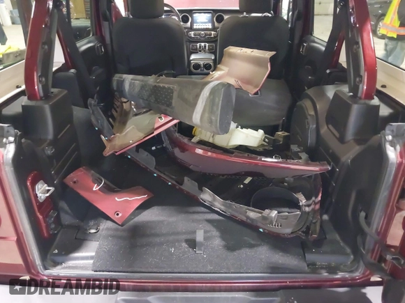 2021 Jeep Wrangler Unlimited Sport S with VIN 1C4HJXDN1MW596334, listed as a IAAI auction lot 41730278 with 64,126 mi miles and . Bid and sale history available at DreamBid. Image 12.