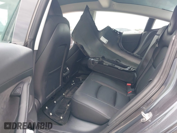 2023 Tesla Model 3 with VIN 5YJ3E1EA7PF417293, listed as a IAAI auction lot 42407659 with 22,578 mi miles and . Bid and sale history available at DreamBid. Image 8.