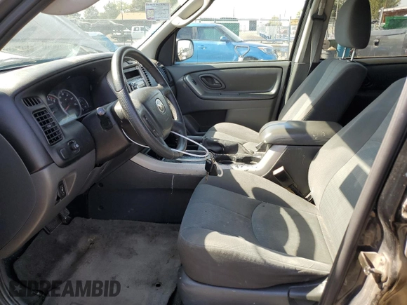 2006 Mazda Tribute i with VIN 4F2YZ02Z16KM36535, listed as a Copart auction lot 74566474 with 254,105 mi miles and Clean Title. Bid and sale history available at carsss.com. Image 7.