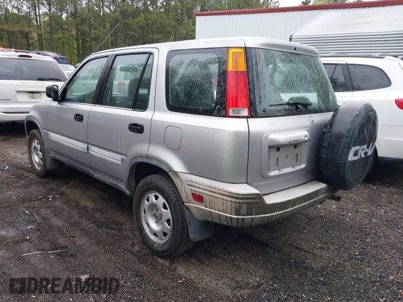 2001 Honda CR-V LX with VIN JHLRD28441C000682, listed as a IAAI auction lot 42019317 with 214,884 mi miles. Bid and sale history available at carsss.com. Image 3.