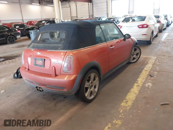 2005 MINI Convertible S with VIN WMWRH33455TK55035, listed as a IAAI auction lot 41936645 with 111,018 mi miles and . Bid and sale history available at DreamBid. Image 4.