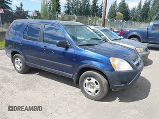 2002 Honda CR-V LX z VIN JHLRD78492C033515, wystawiony jako IAAI lot #41934633 z przebiegiem 276 622 mil mil oraz . Historia ofert i sprzedaży dostępna na DreamBid. Obrazek 1.