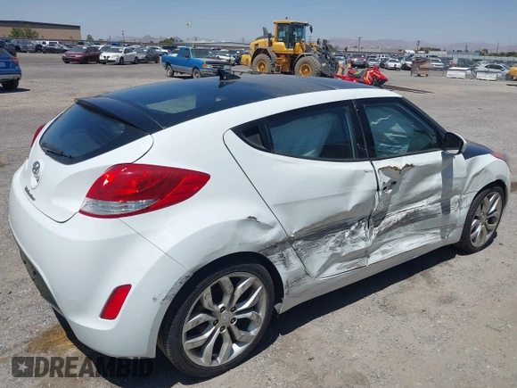 2014 Hyundai Veloster RE:FLEX with VIN KMHTC6AD7EU214911, listed as a IAAI auction lot 42617066 with 115,521 mi miles and . Bid and sale history available at DreamBid. Image 4.