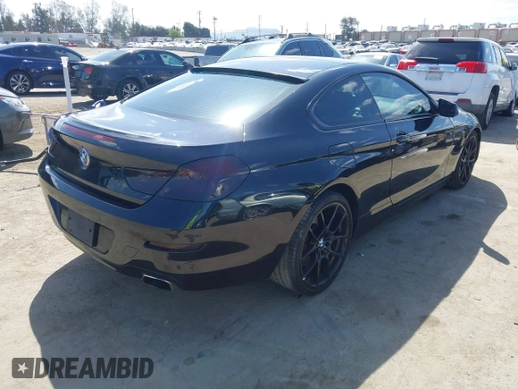 2013 BMW 6 Series 650i with VIN WBAYM9C57DDW20178, listed as a IAAI auction lot 41933561 with 72,886 mi miles and . Bid and sale history available at carsss.com. Image 4.